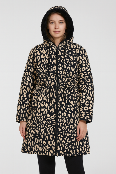 Person wearing a leopard print coat on a white background