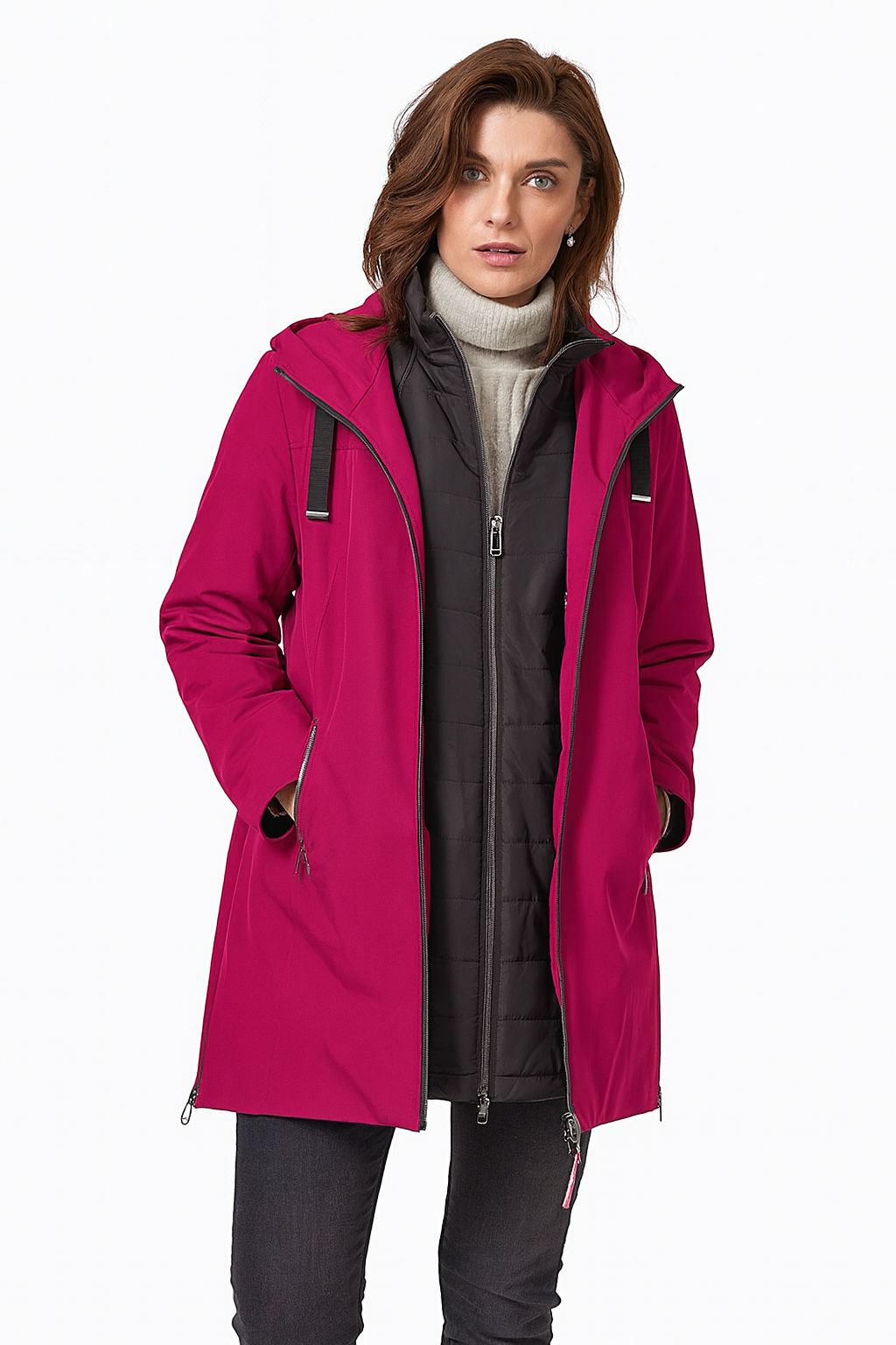 Woman wearing a pink coat on a white background