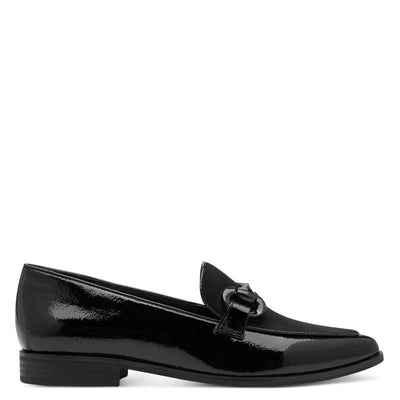 Black patent leather loafer on a white background