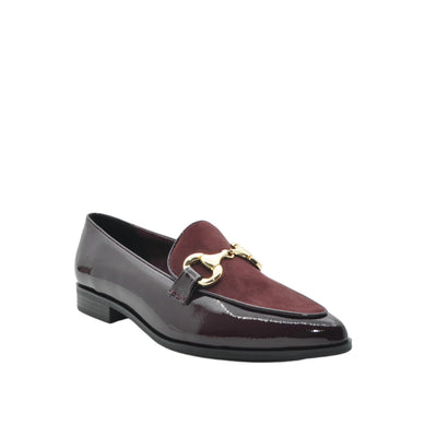 Burgundy loafer with gold buckle on a white background