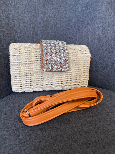 Nicole woven clutch bag