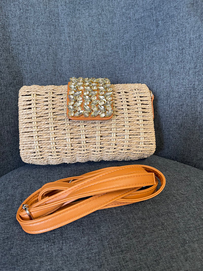 Nicole woven clutch bag