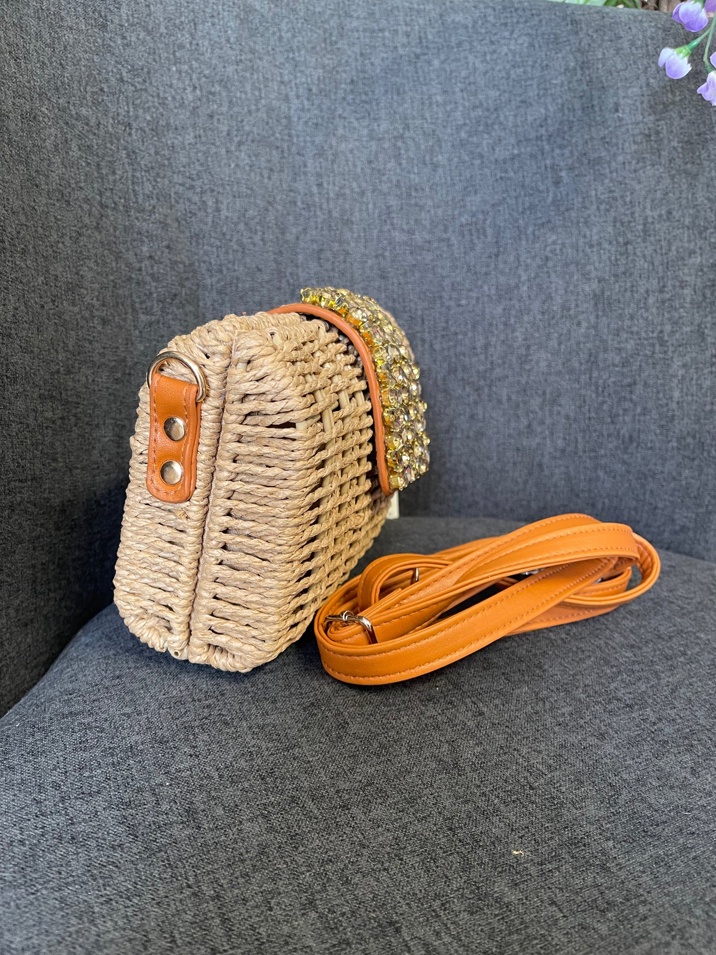 Nicole woven clutch bag
