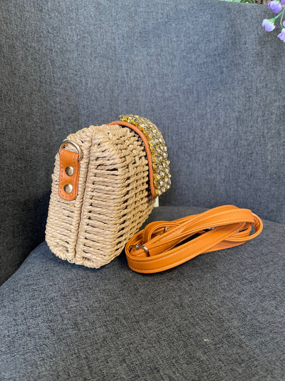 Nicole woven clutch bag