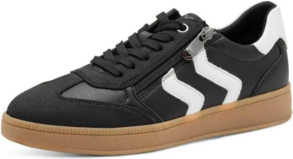 Black sneaker with white accents on a white background