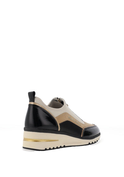 Black and beige sneaker with gold accents on a white background