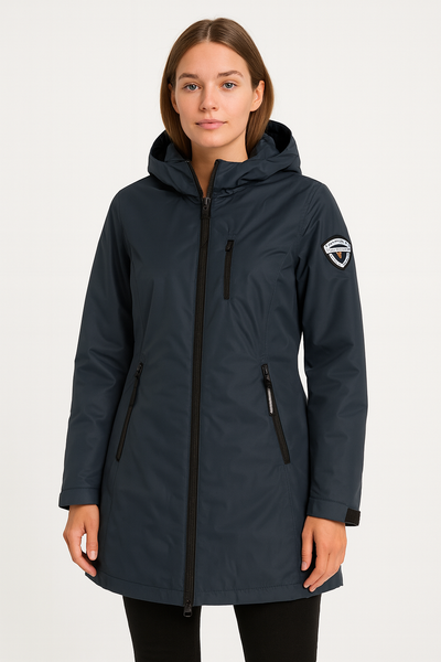 Woman wearing a navy blue jacket with a brand logo on a white background