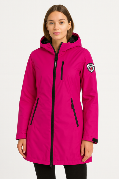 Woman wearing a bright pink jacket with a brand logo on a white background