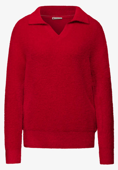 Red sweater on a white background