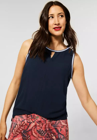 Top with decorative stitching