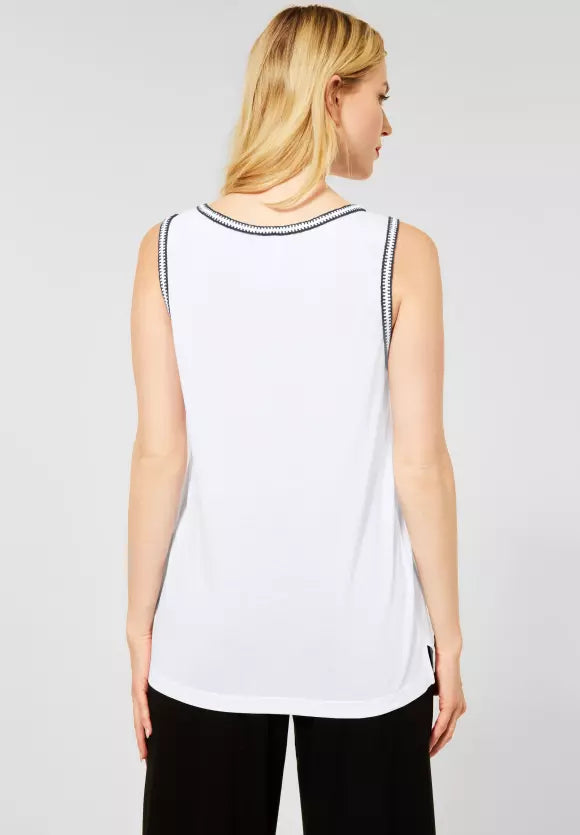 Top with decorative stitching